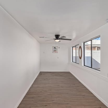 Bright Room with Wood-Look Flooring - Flooring Installation by Builders For You Construction in Yuma, AZ