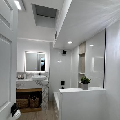 Bright White Modern Bathroom Bright White Modern Bathroom - Bathroom Remodeling by Builders For You Construction in Yuma, AZ