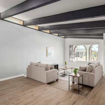 Living Room with Light Wood Flooring - Flooring Installation by Builders For You Construction in Yuma, AZ