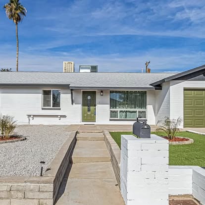 White Brick Facade & Green Door - Exterior Projects by Builders For You Construction in Yuma, AZ