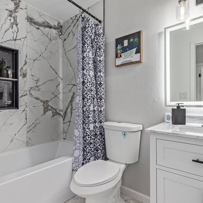Classic White Shower & Tub Combo Classic White Shower & Tub Combo - Bathroom Remodeling by Builders For You Construction in Yuma, AZ