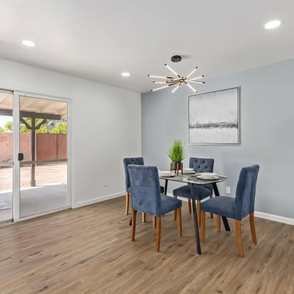 Dining Room with Wood-Look Flooring - Flooring Installation by Builders For You Construction in Yuma, AZ
