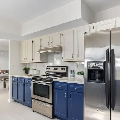 Stainless Steel Refrigerator and Blue Cabinets - Kitchen Remodeling by Builders For You Construction in Yuma, AZ