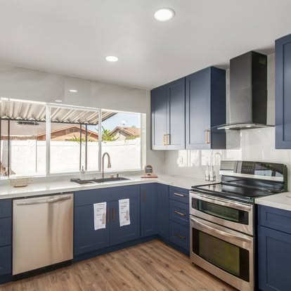 Modern Kitchen with Blue Base Cabinets - Kitchen Remodeling by Builders For You Construction in Yuma, AZ