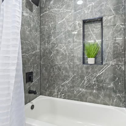 Grey Marble-Look Shower with Niche Grey Marble-Look Shower with Niche - Bathroom Remodeling by Builders For You Construction in Yuma, AZ