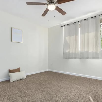 Bedroom with Plush Carpet Flooring - Flooring Installation by Builders For You Construction in Yuma, AZ