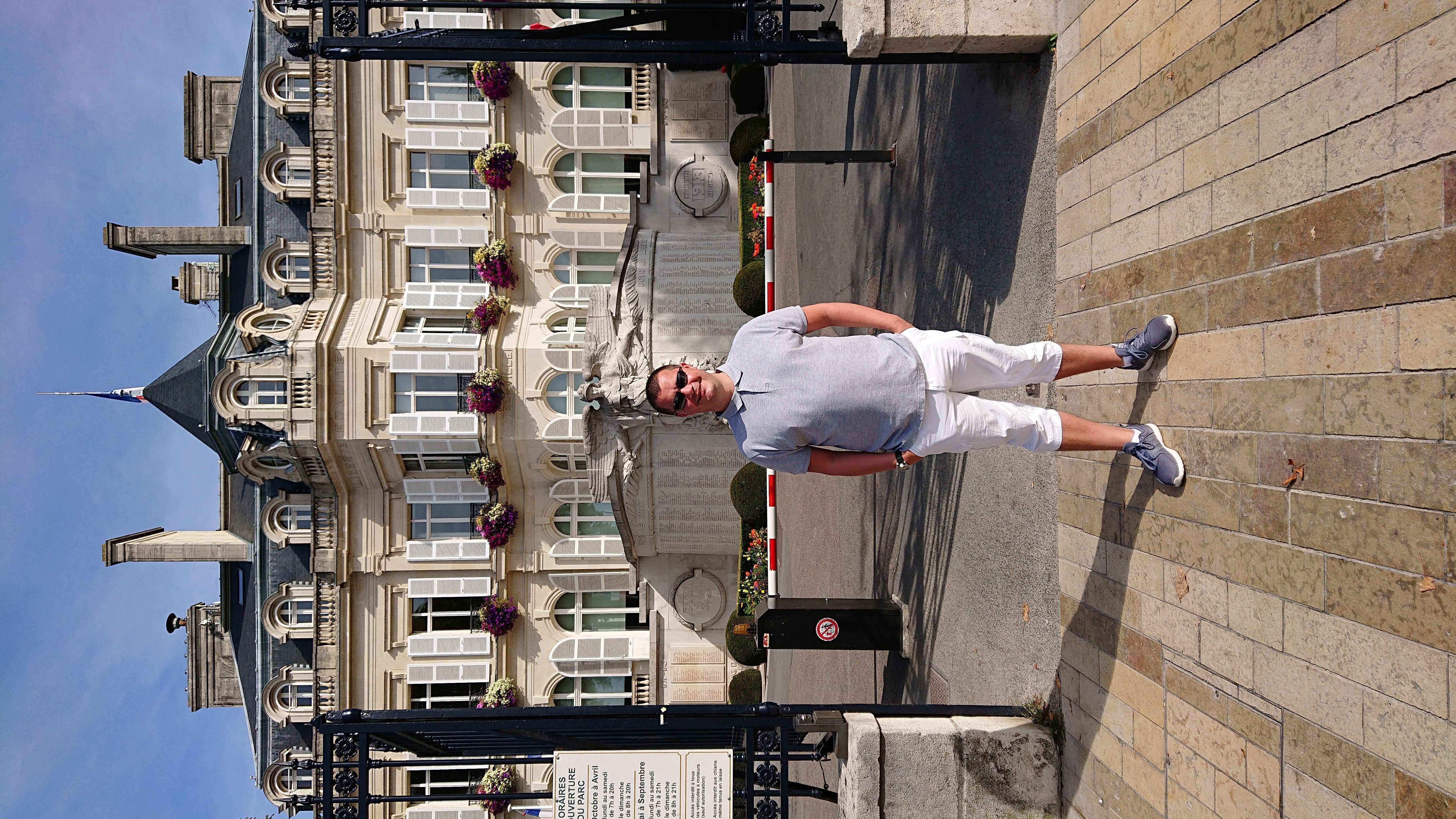 Leon Lavin standing in front of building