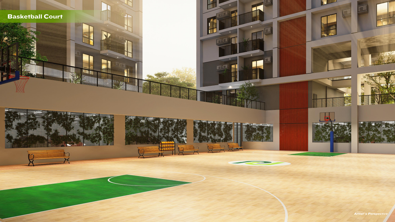 Basketball Court - Full court with green flooring and spectator benches