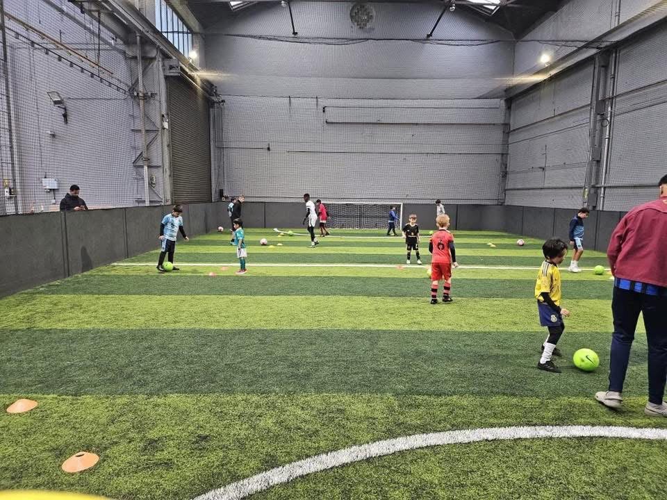 Youth football coaching session at Aspire Elite Football Academy