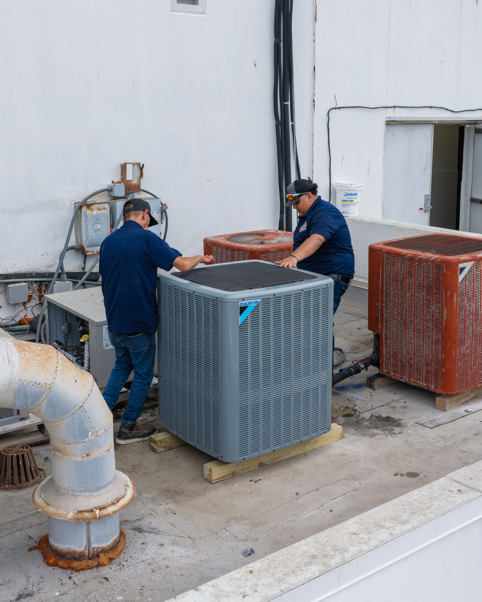 Alpha HVAC Crew Installing Rooftop Commercial Daikin AC Unit
