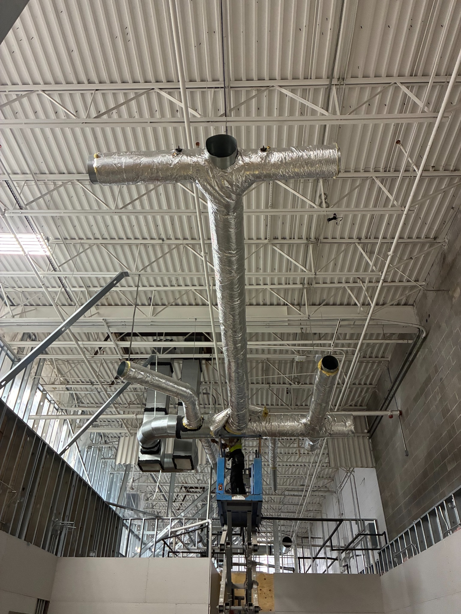 Commercial HVAC Spiral Overhead Trunk Ductwork Installation — Pharr, TX