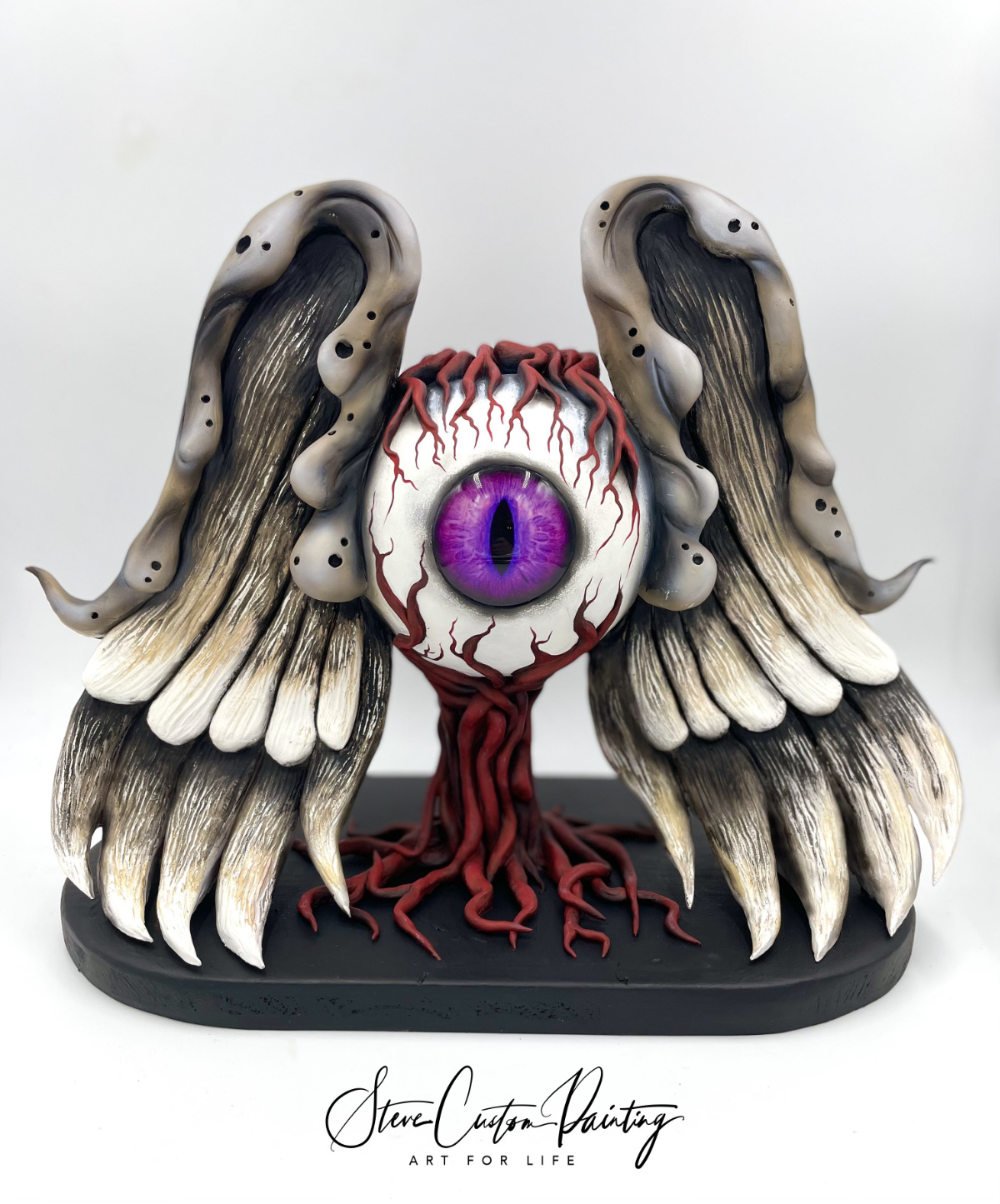 Eyeball Wings Sculpture