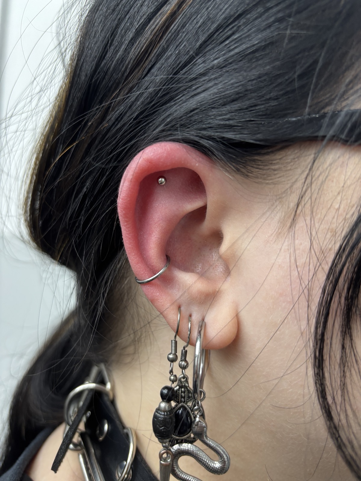 Helix und Conch Piercing Tattoos by Steve