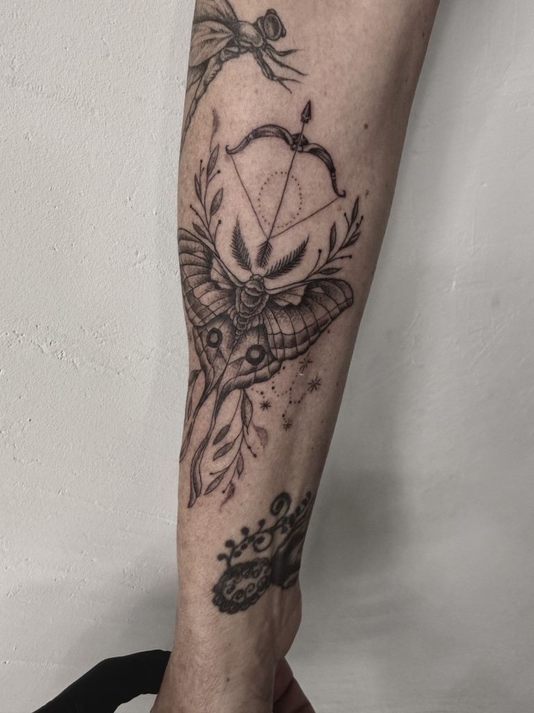 Fineline Moth Tattoo Black and Grey Sagittarius Tattoo Studio Salzburg 4