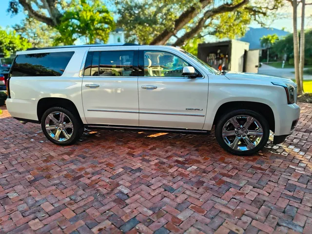 Detailed white GMC Yukon Denali SUV