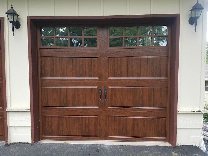 Wood-look garage door with top windows