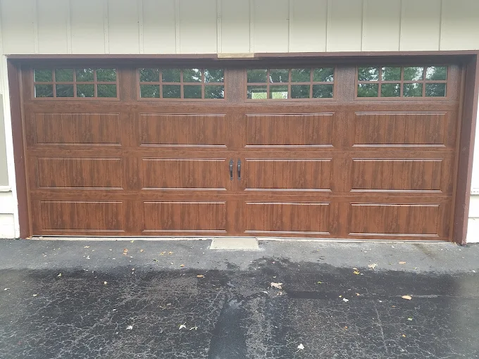Wood-look garage door with top windows