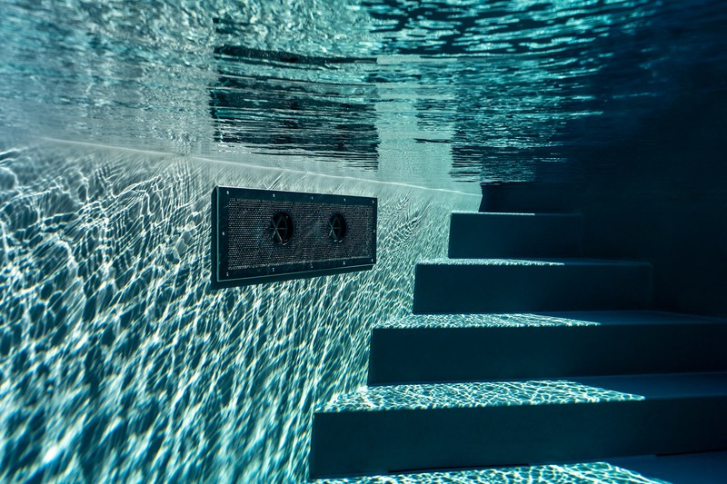 Close-up of feet in soft mineral pool water