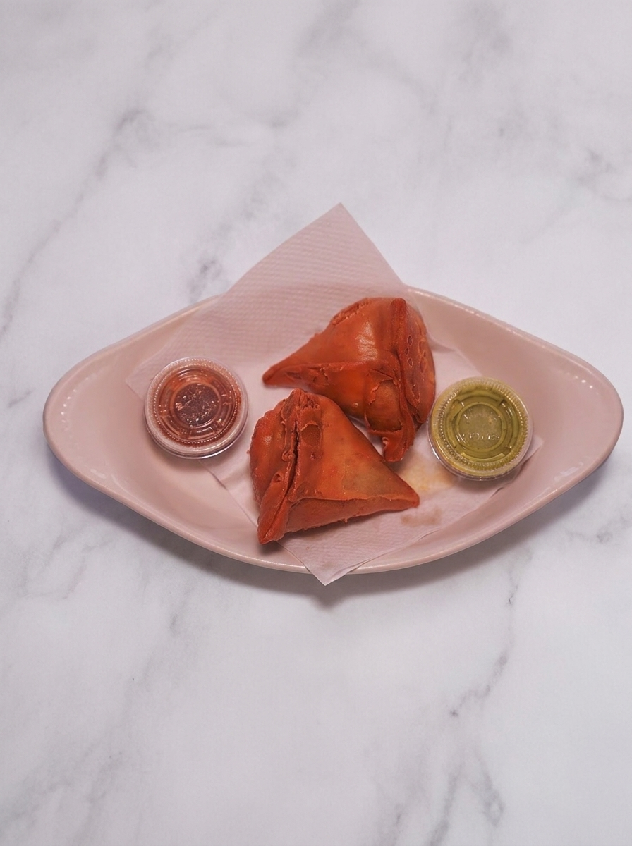 Golden Nepali samosas served at P.K. Curry House Food Truck in Youngstown, Ohio
