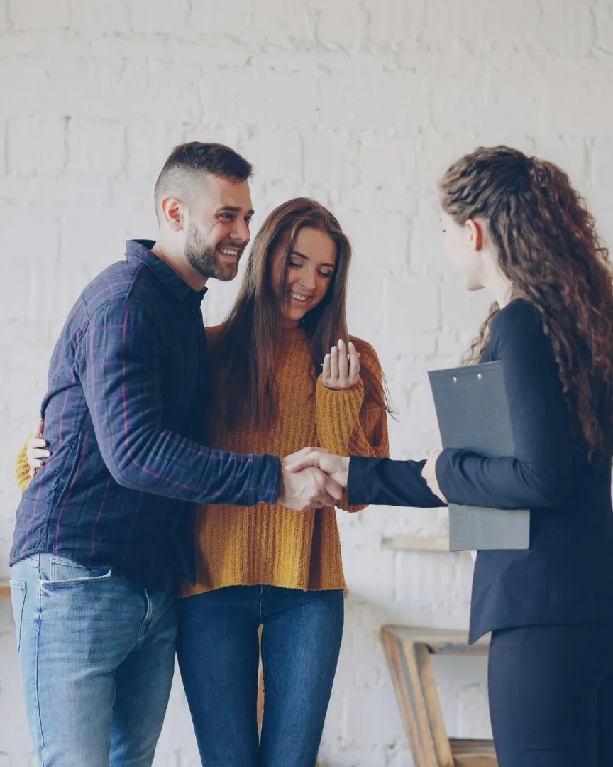 Real estate agent with clients