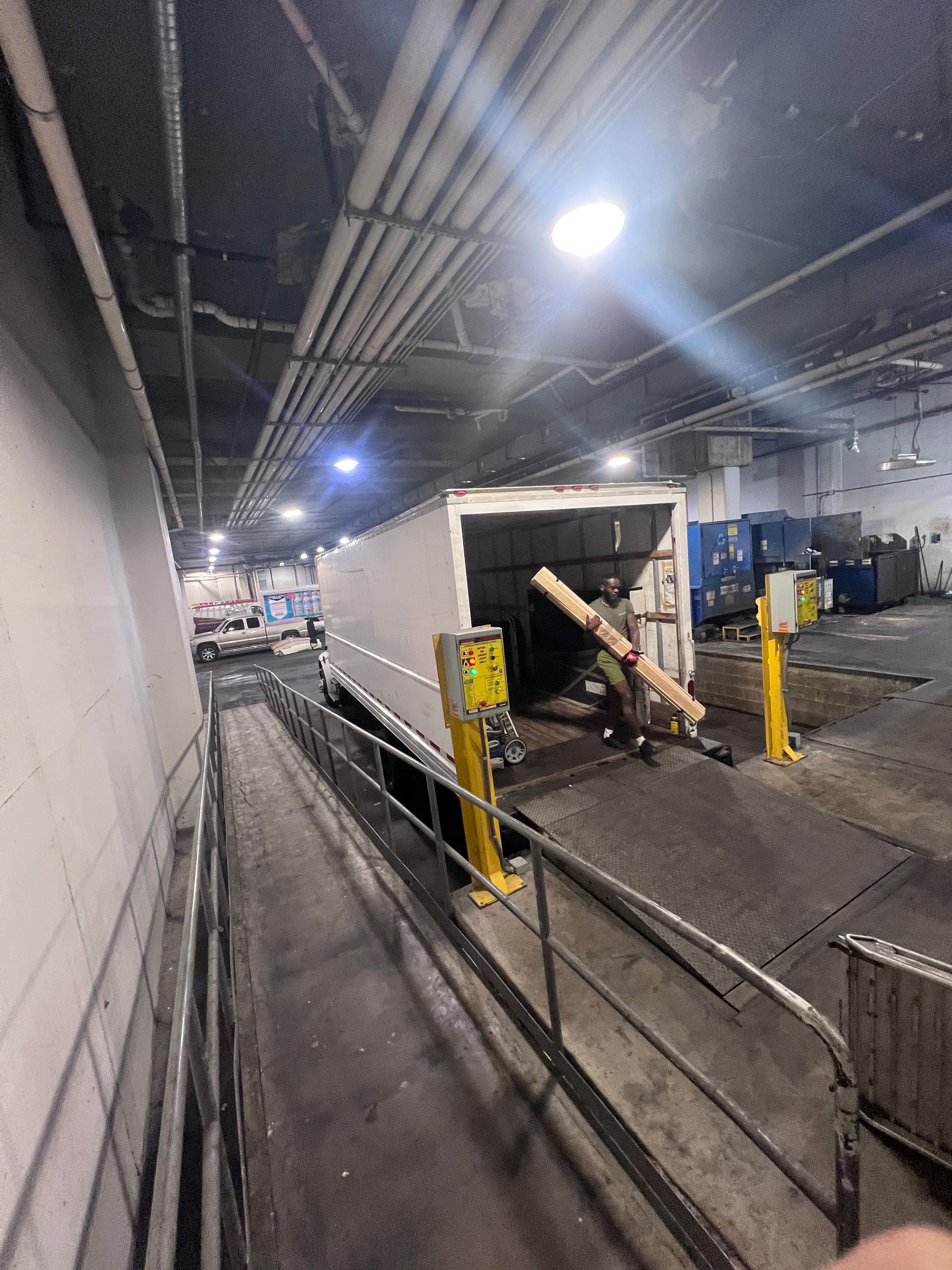 Professional mover loading truck