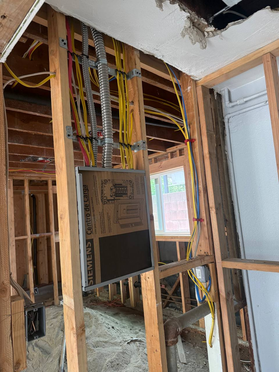 Residential electrical rough-in with Siemens panel and conduit by Frontline Electric Inc