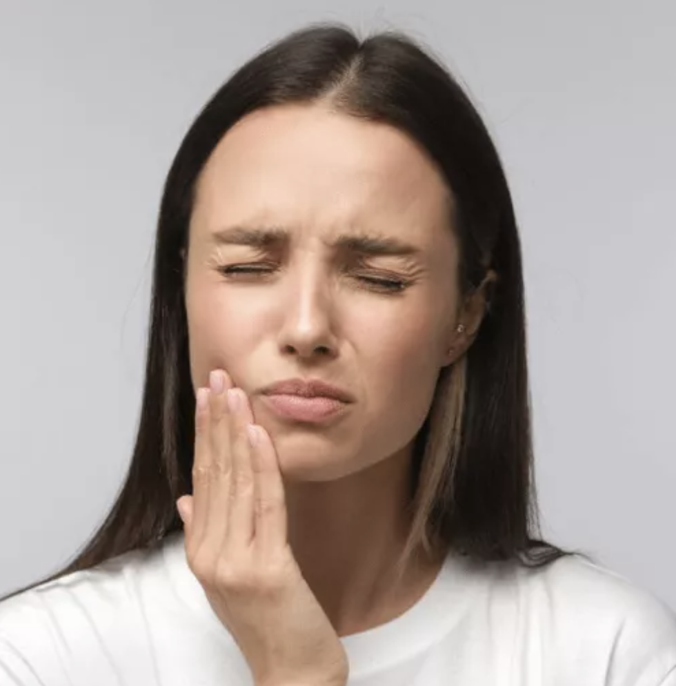 Woman experiencing tooth pain