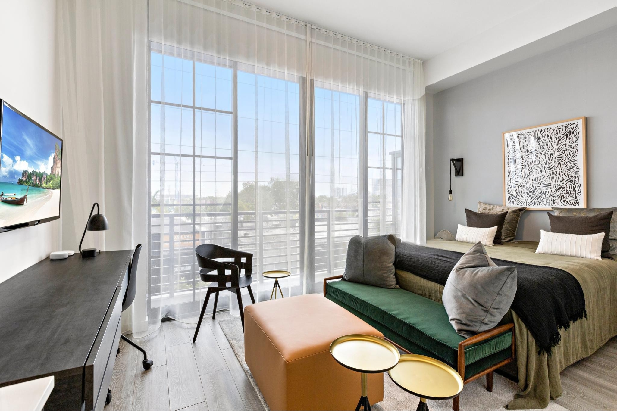 Studio living area with large windows