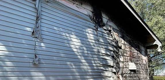 Fire-damaged house bought for cash in St. Louis Missouri