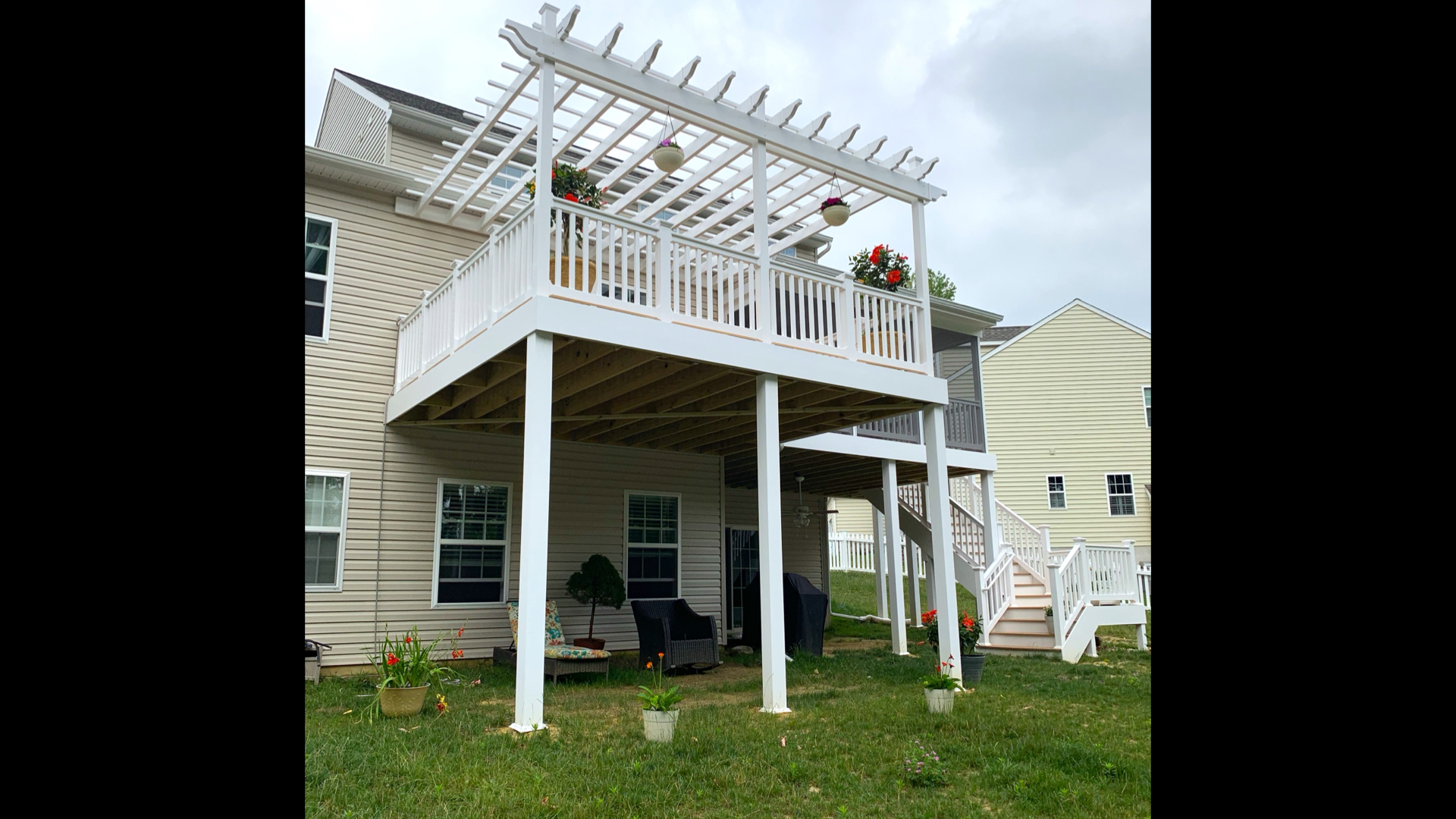 Elevated Deck with Custom White Pergola
