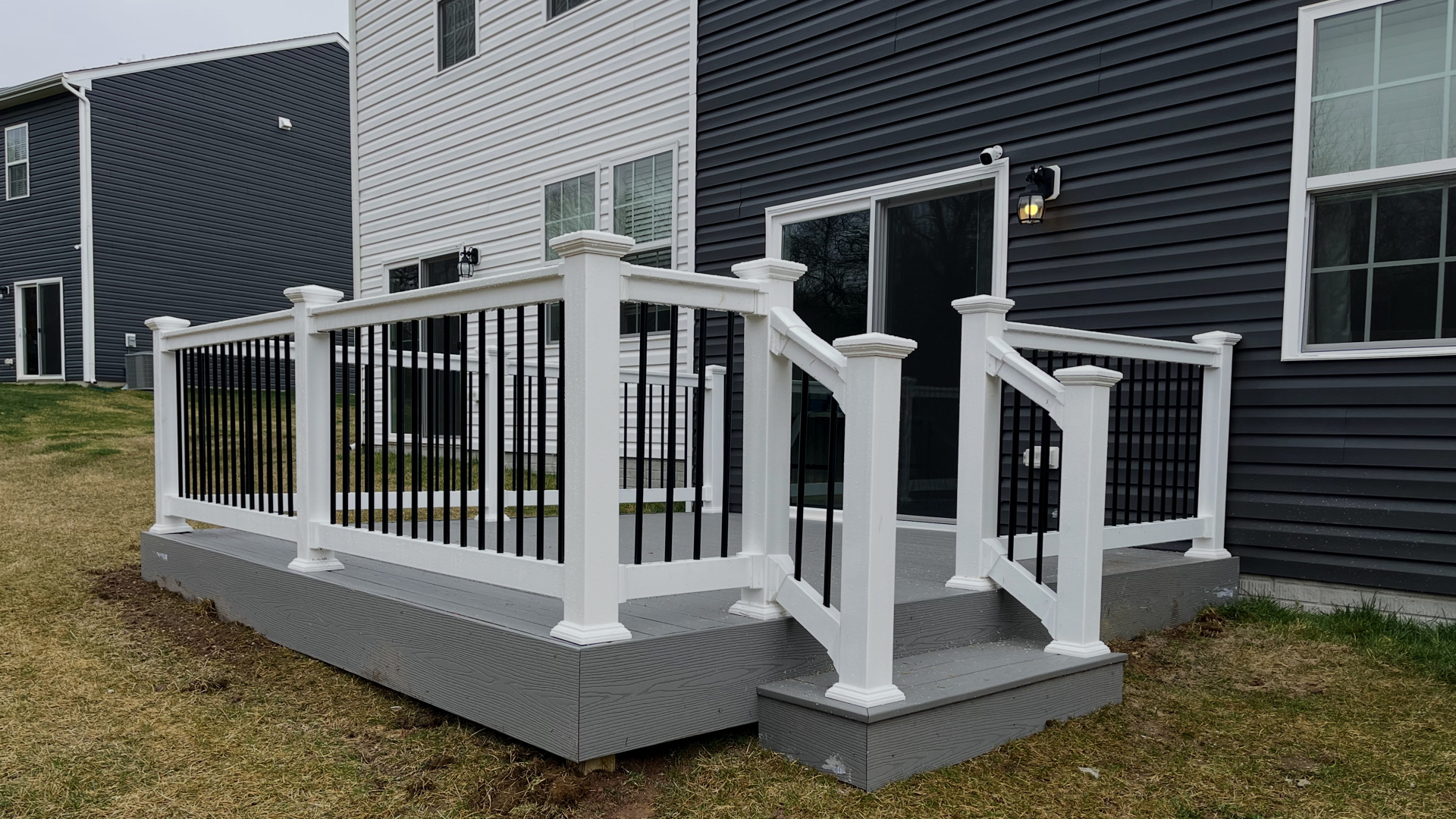 Modern Gray Composite Deck with White Railing
