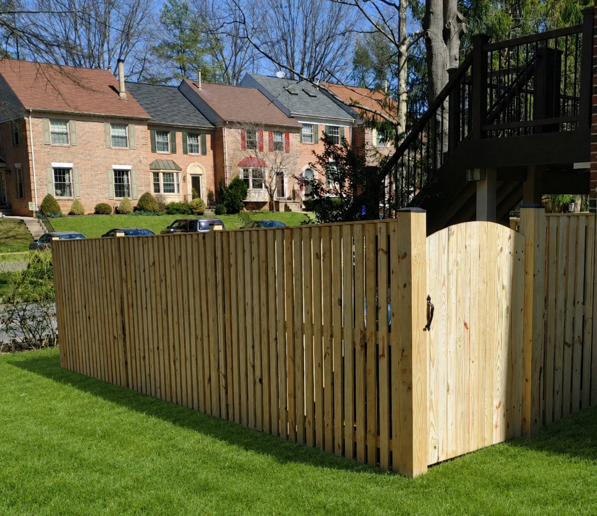 Wooden Privacy Fence with Arched Gate