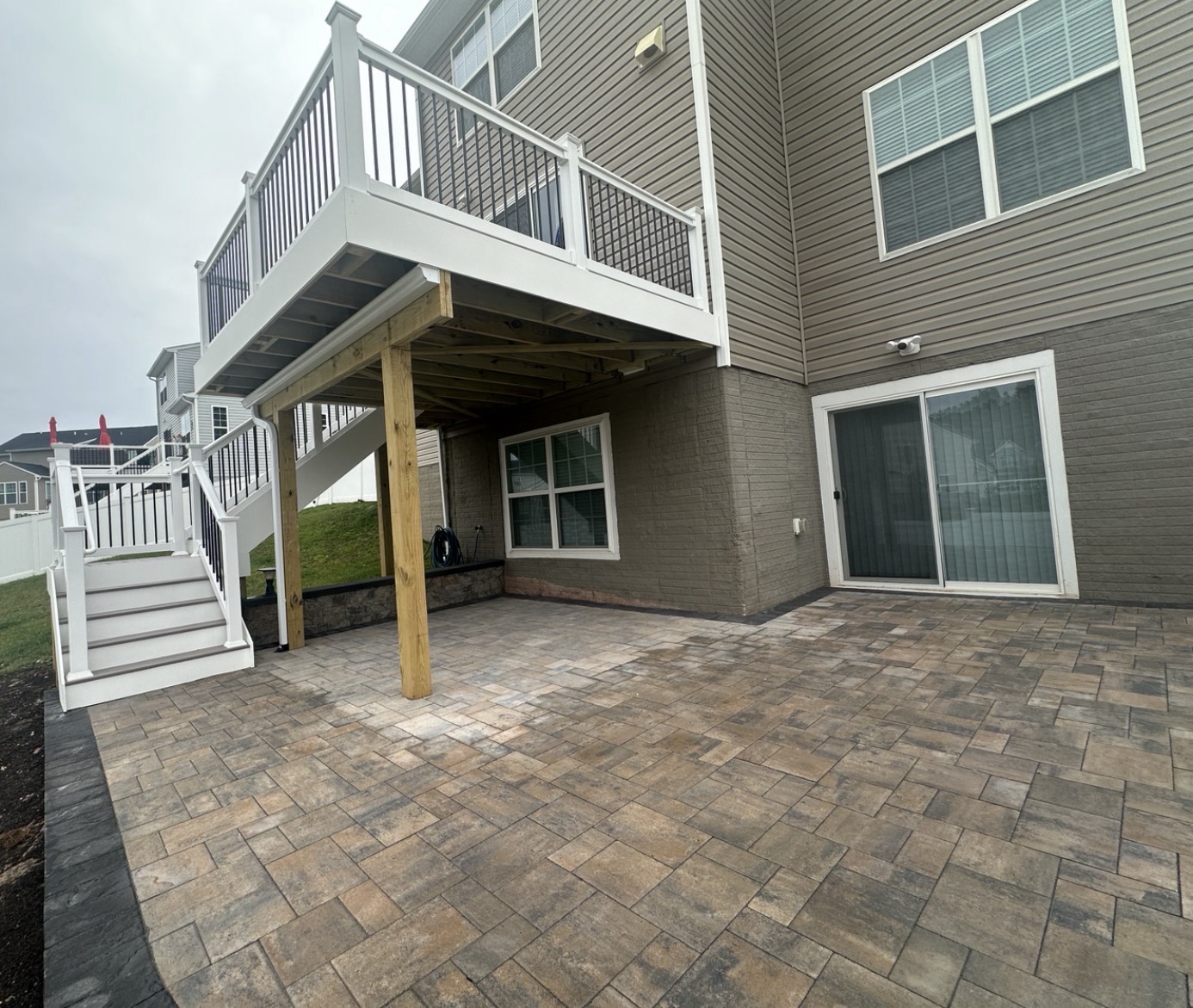 Elevated Deck Over Stone Paver Patio