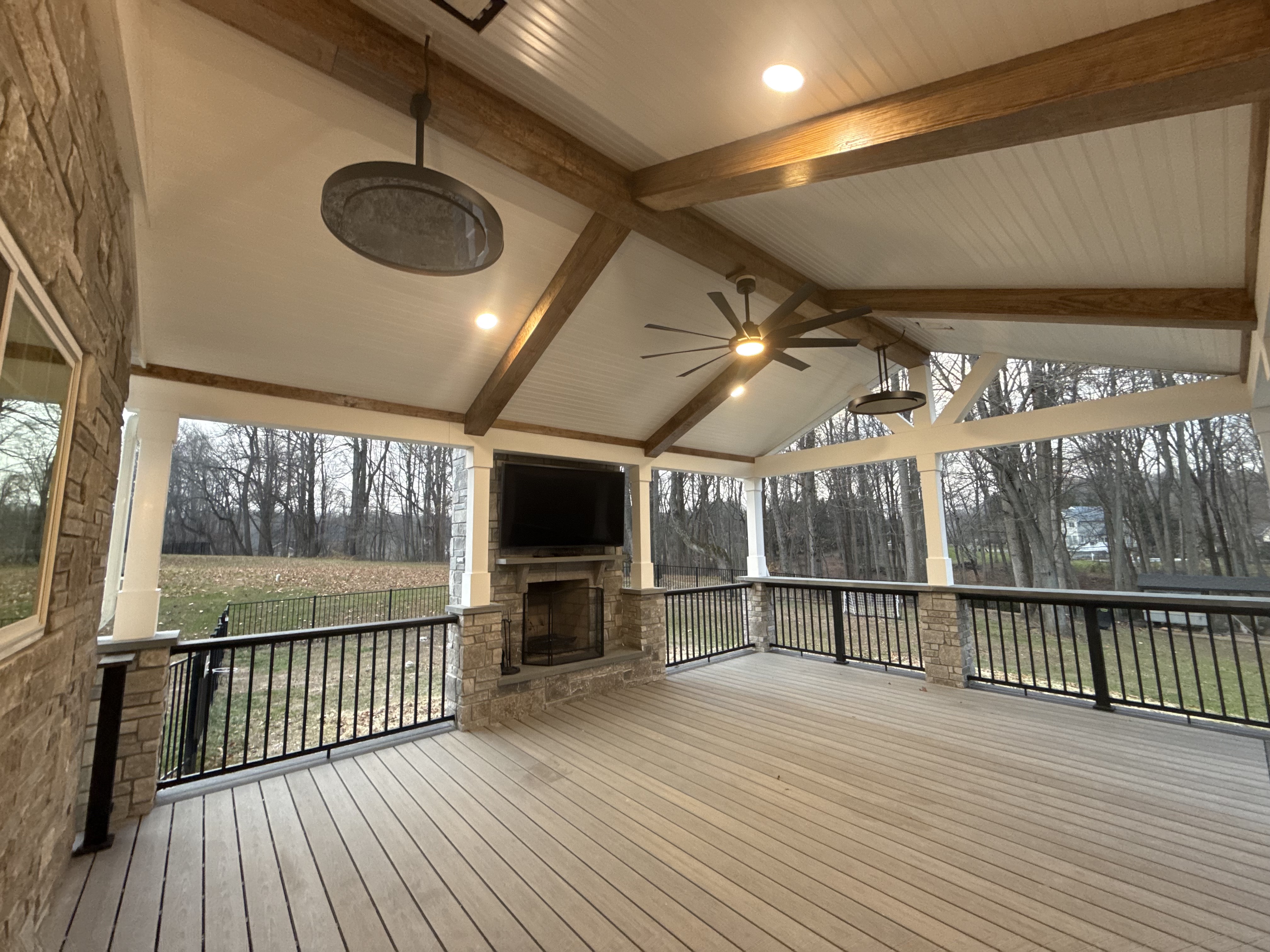 Spacious Covered Porch with Fireplace & TV