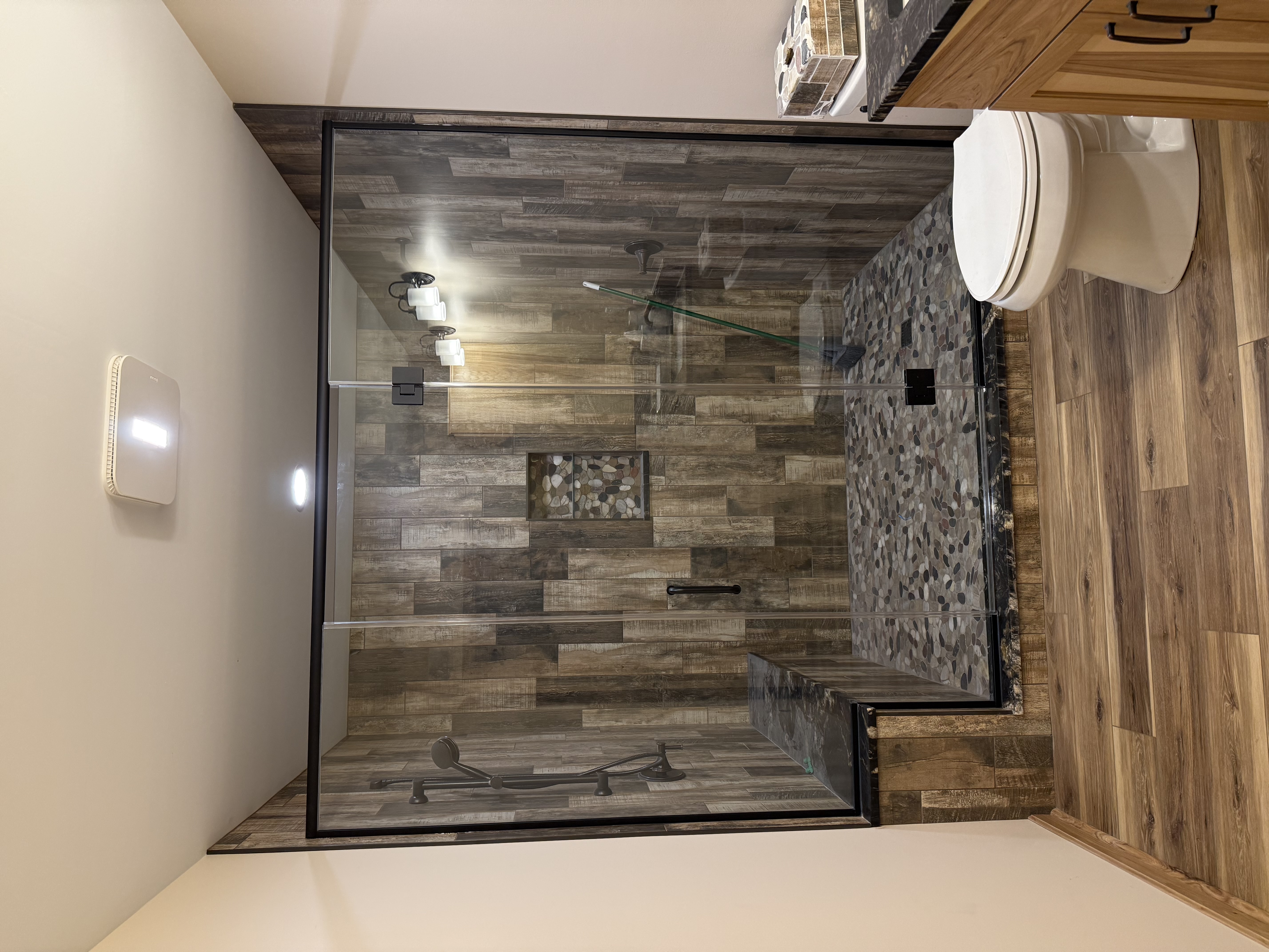 Premium glass shower enclosure with matte black hardware
