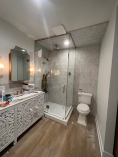 Luxury frameless glass shower with chrome hardware