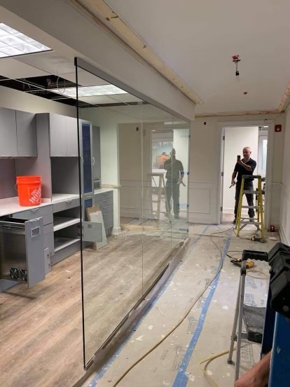 Glass partition walls with sliding doors