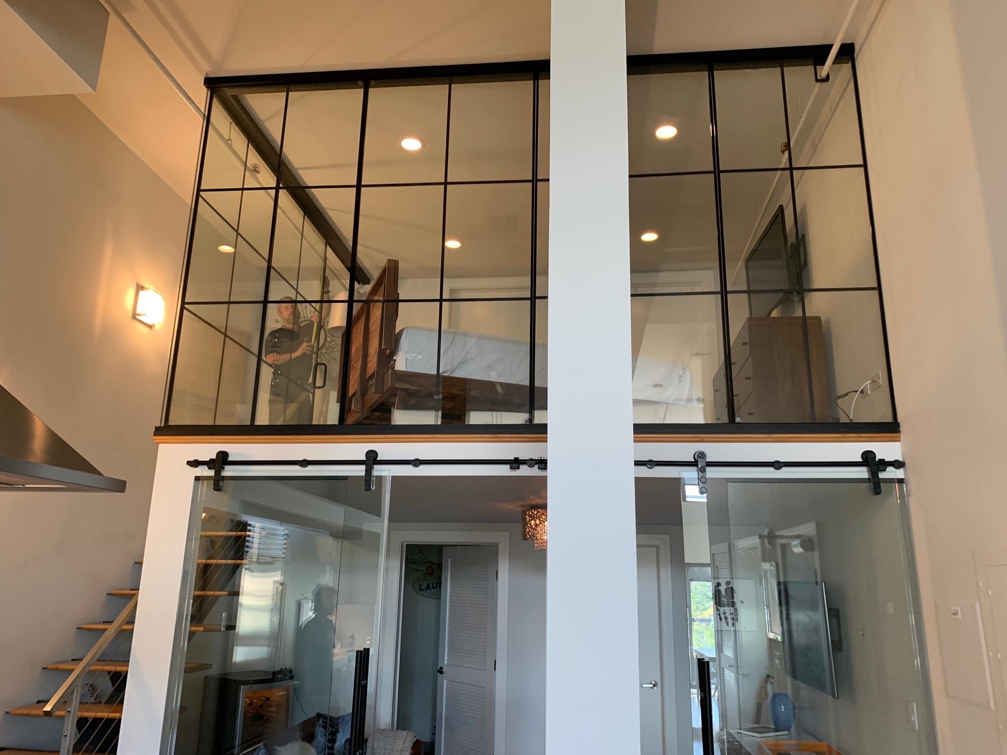 Custom glass loft enclosure for residential home