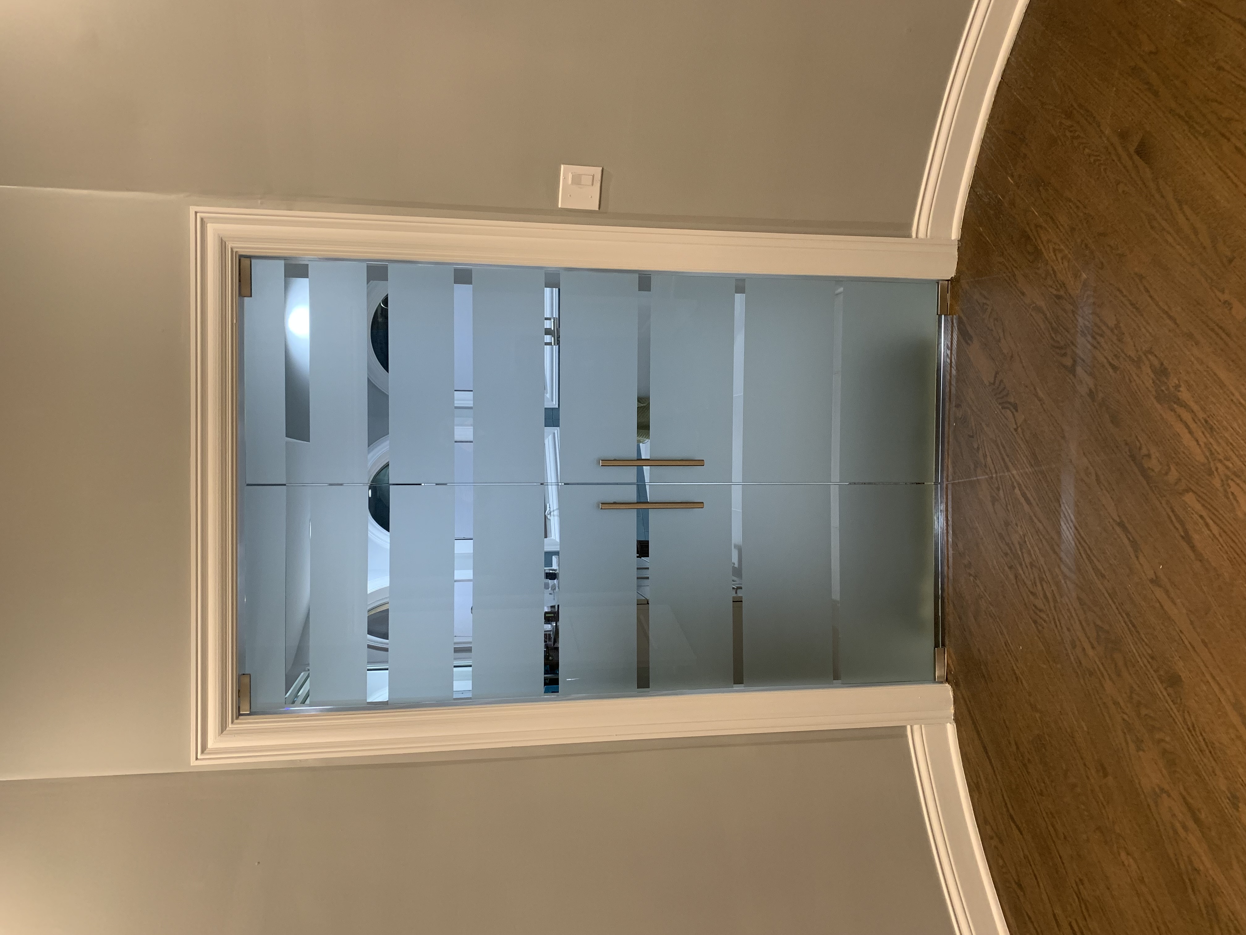 Custom frosted glass doors for privacy in office