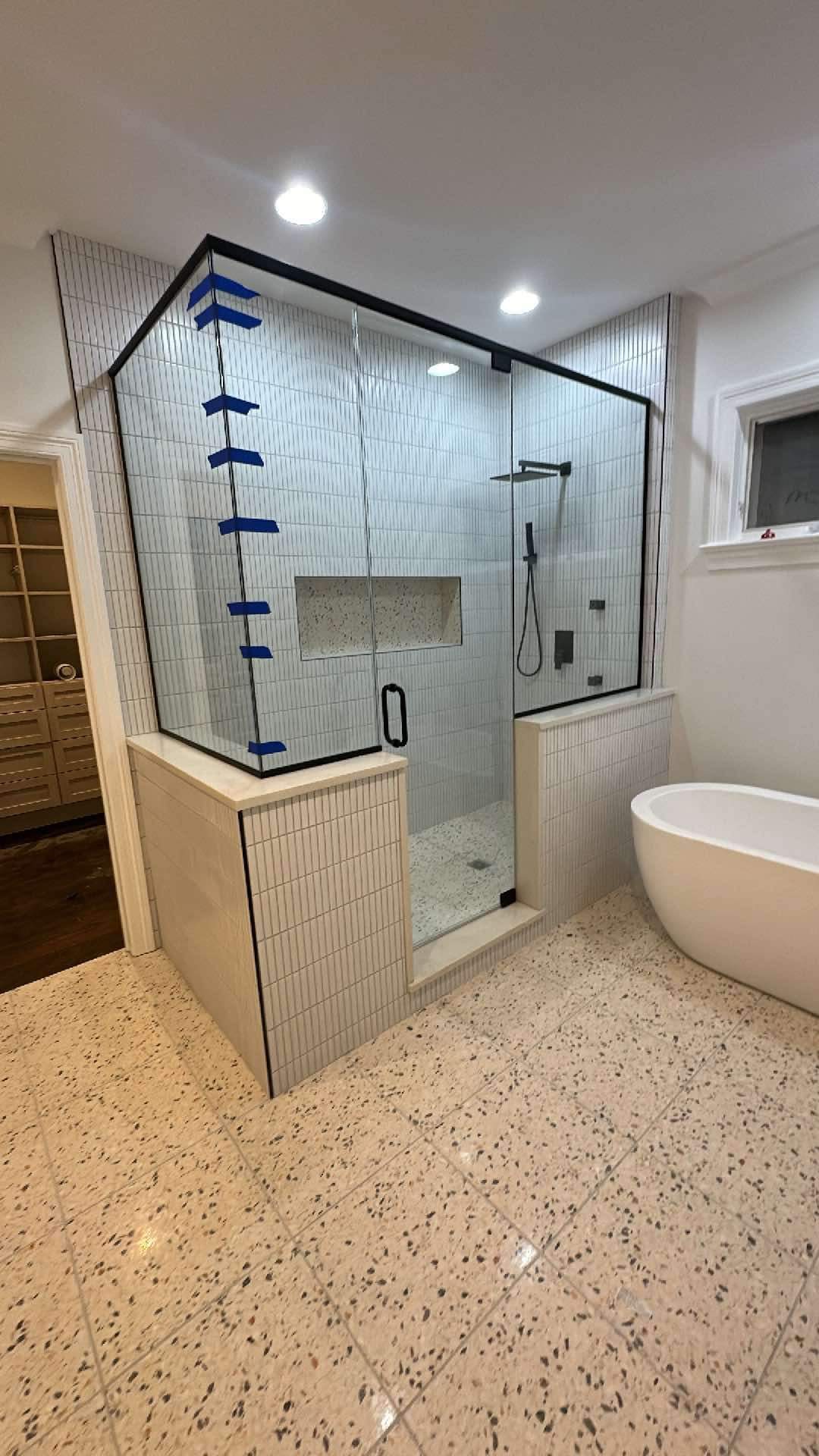 Frameless corner glass shower enclosure