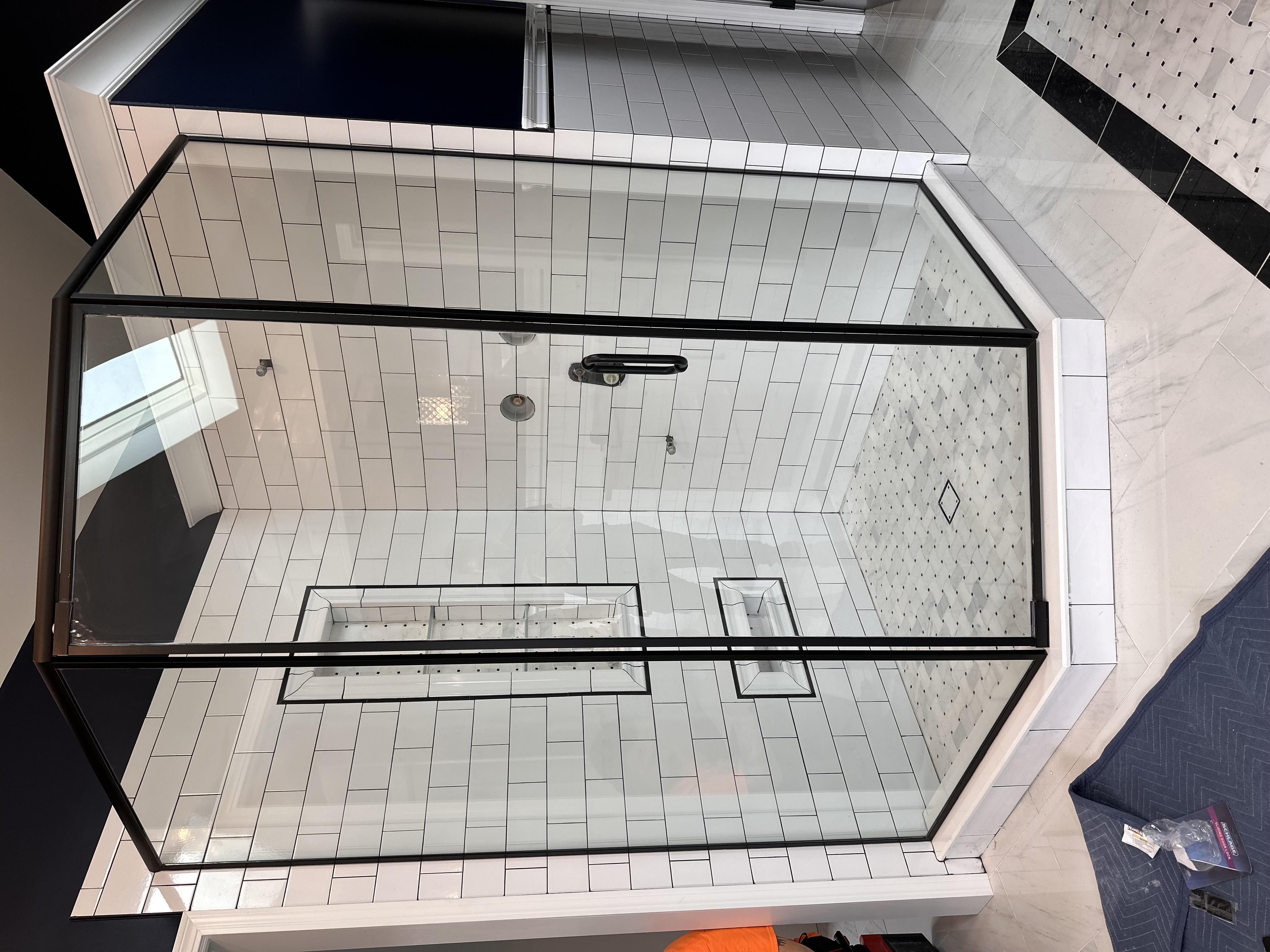 Custom cut frameless glass shower door Chicago
