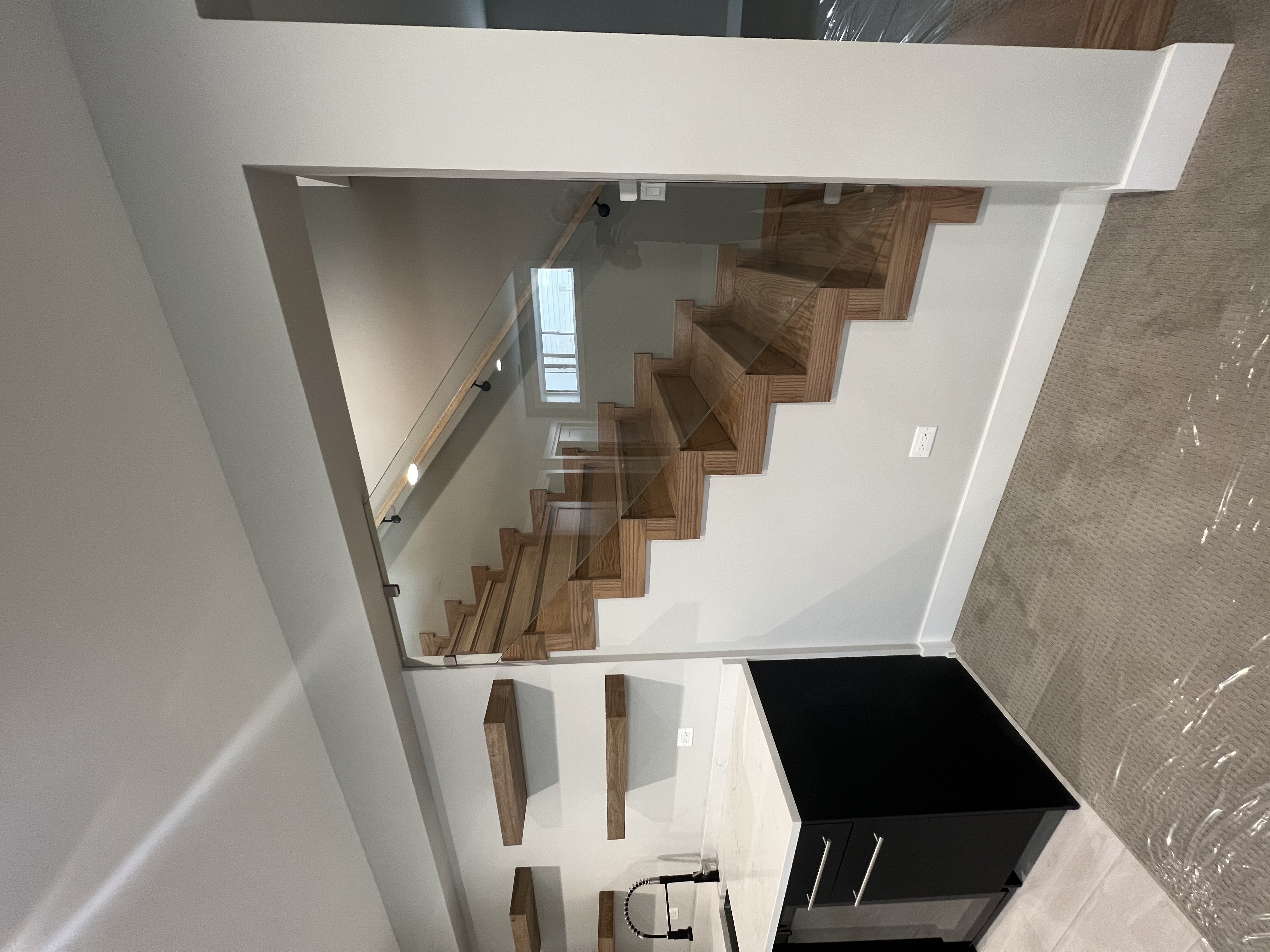 Custom glass balcony railing installation in Chicago