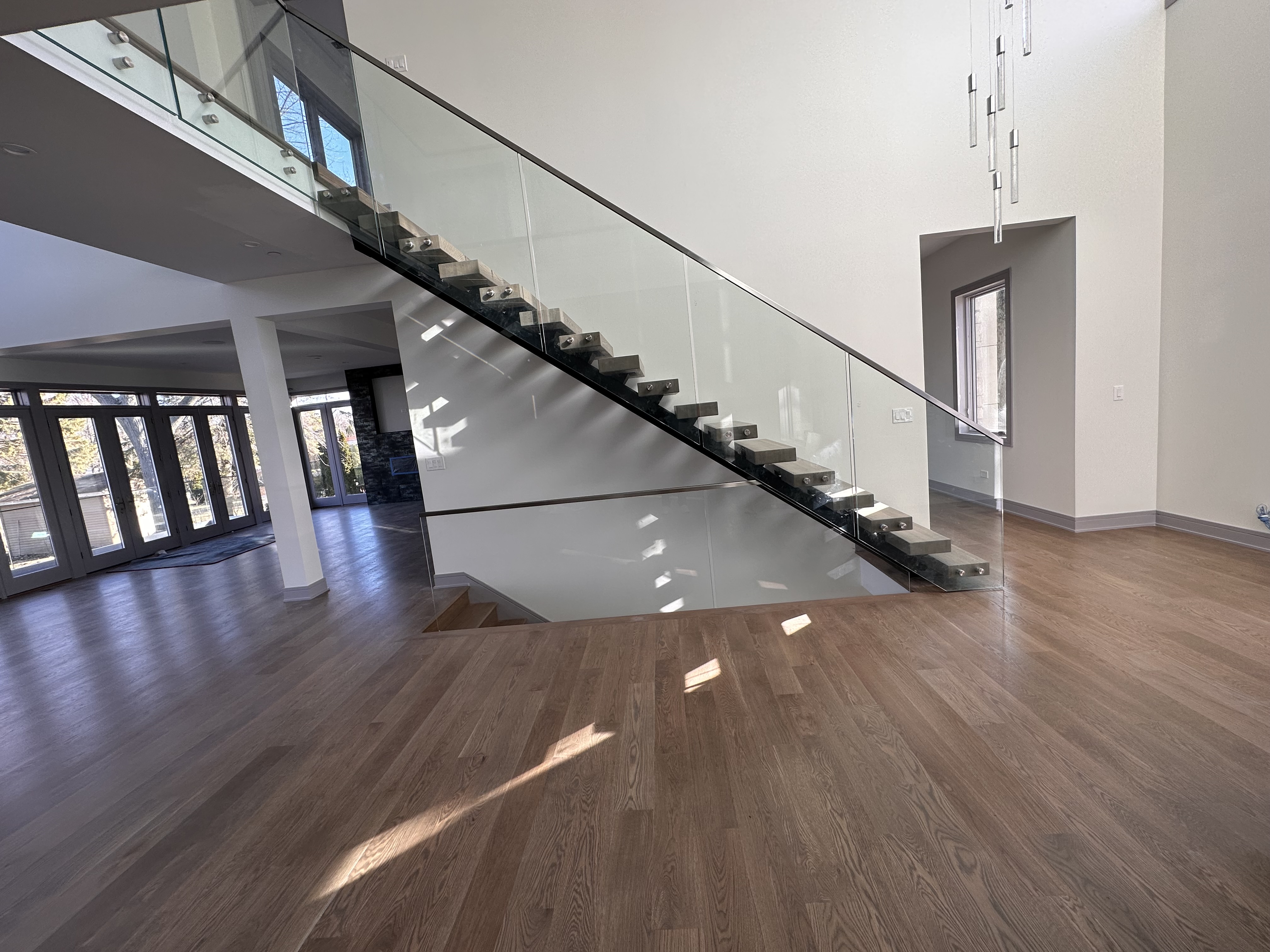 Sleek frameless glass railing design