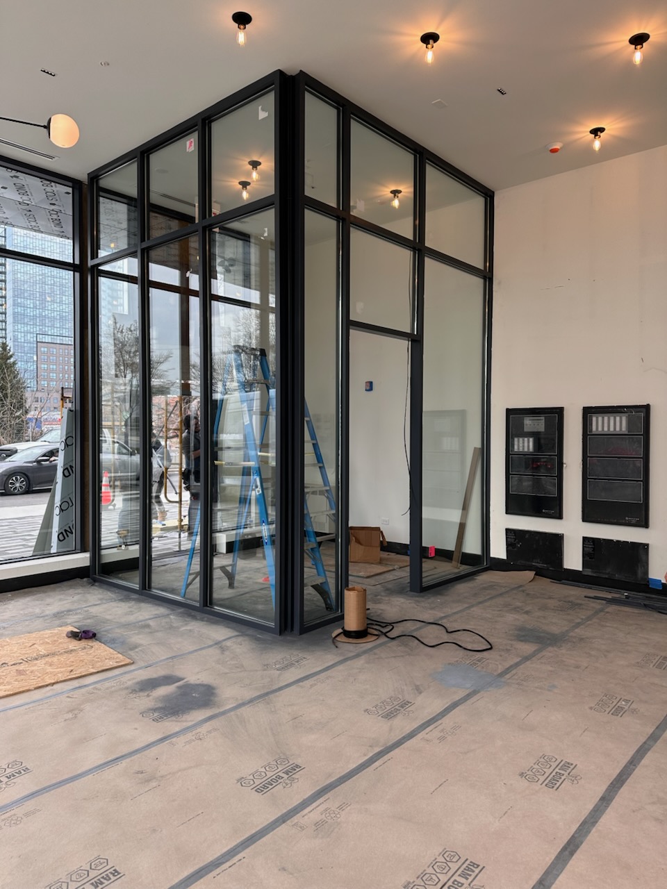 Large commercial glass storefront windows installed