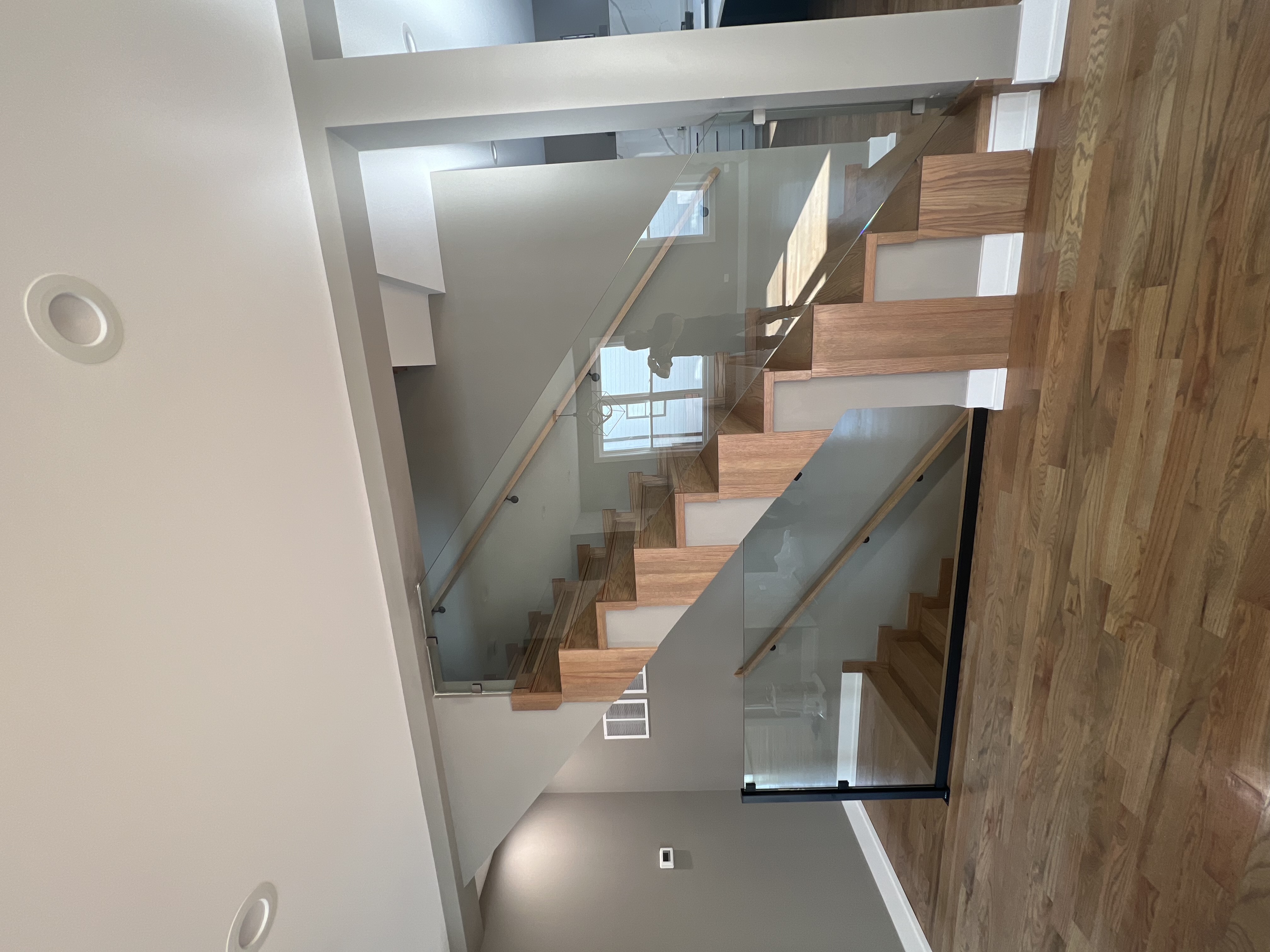 Modern glass staircase railing system