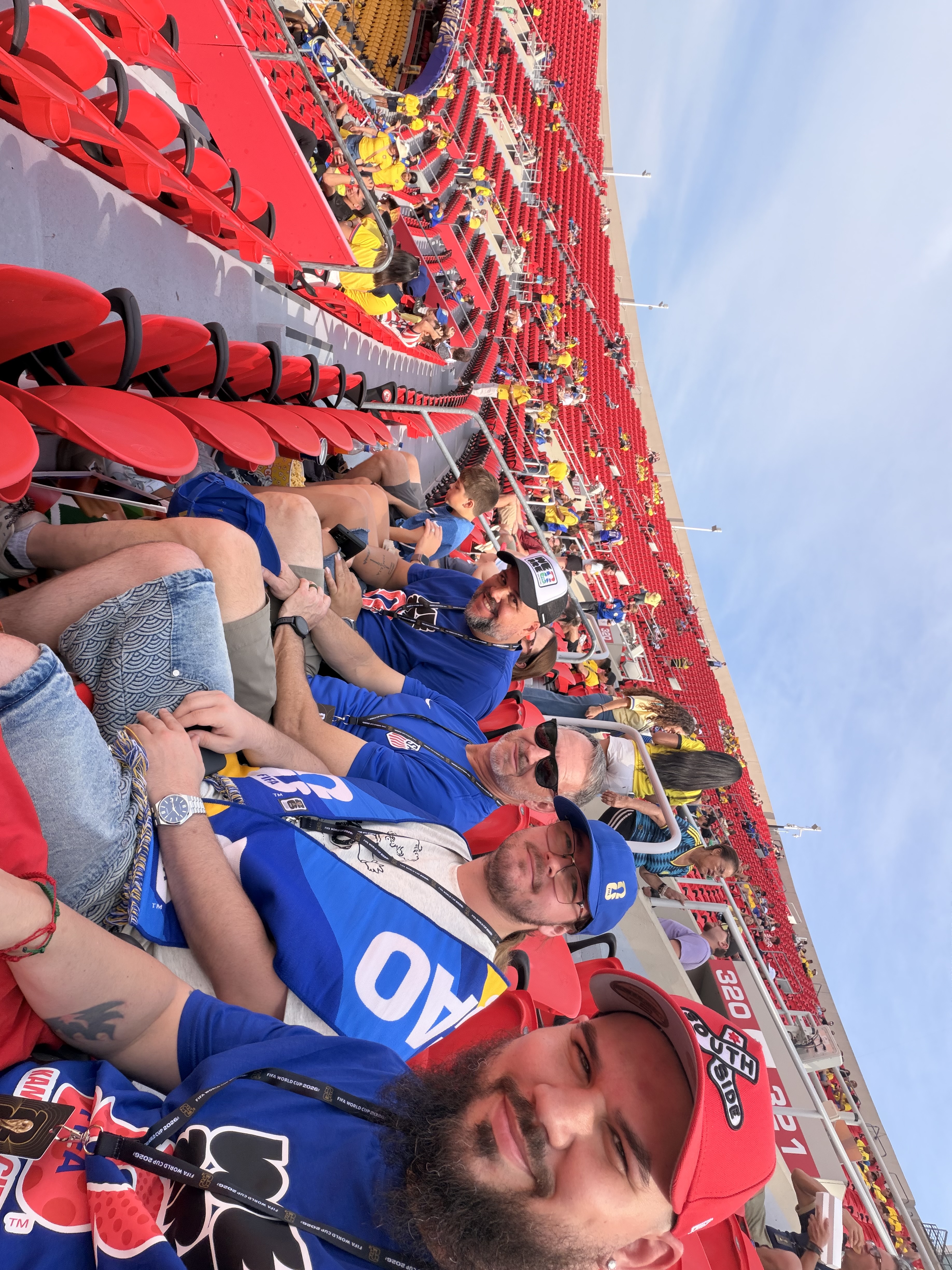 Action Technology Services employees attending an event at a sports stadium