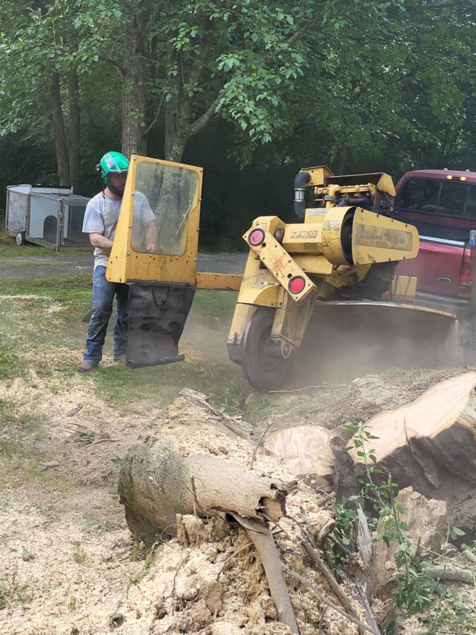 Professional stump grinding equipment in use