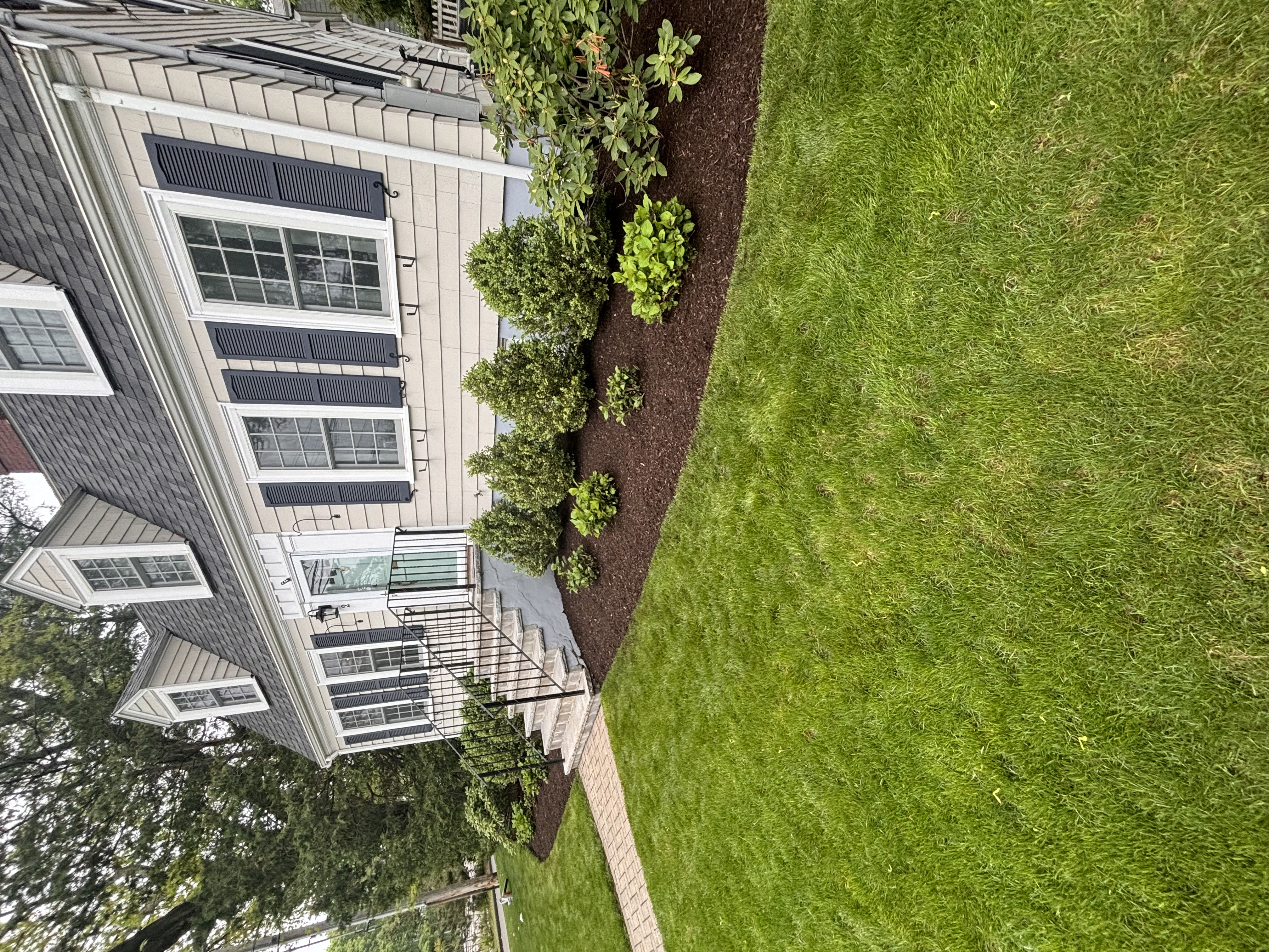 Freshly mowed lawn in Arlington, MA by Jake's Landscaping