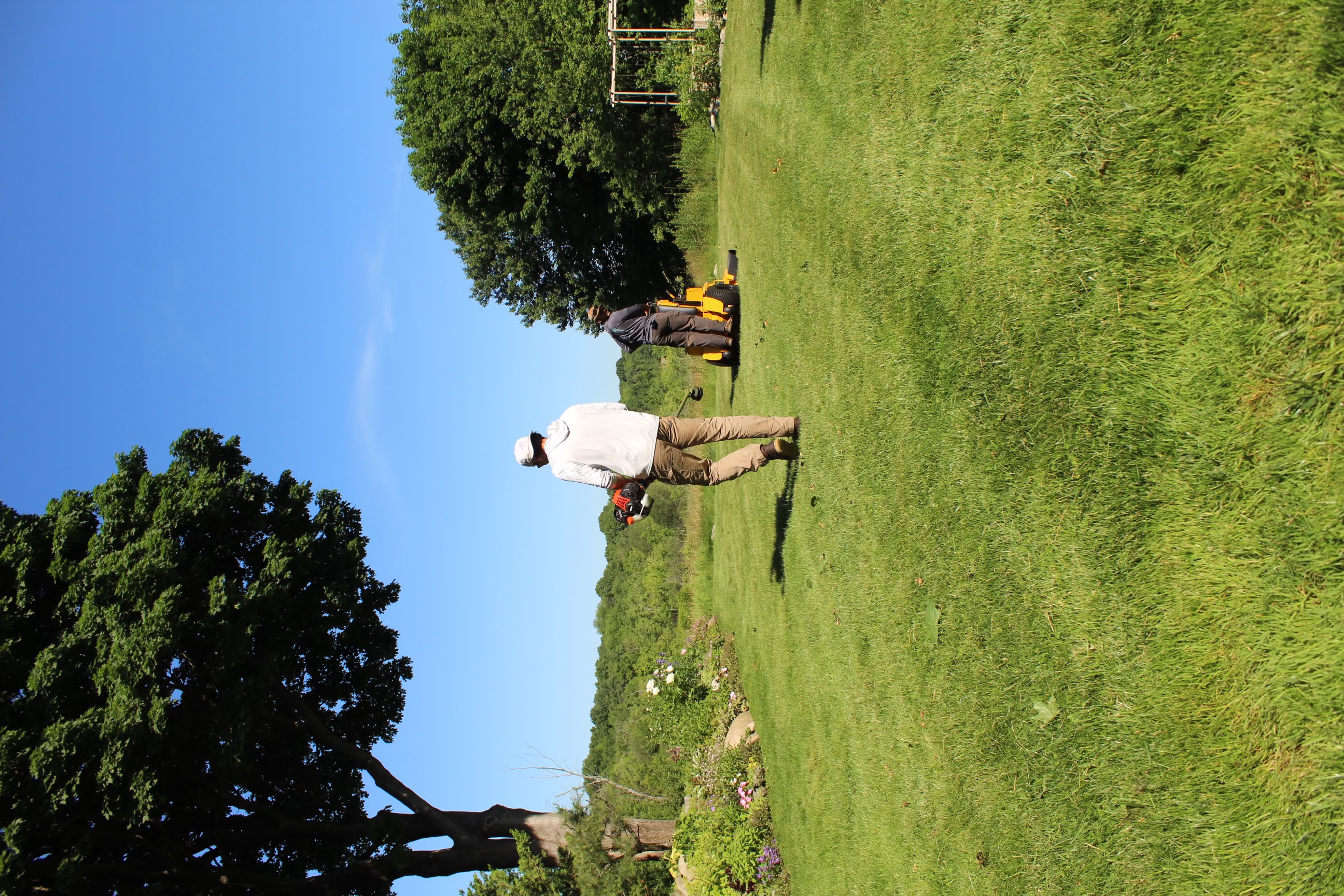 Jake's Landscaping crew servicing a property in Winchester, MA