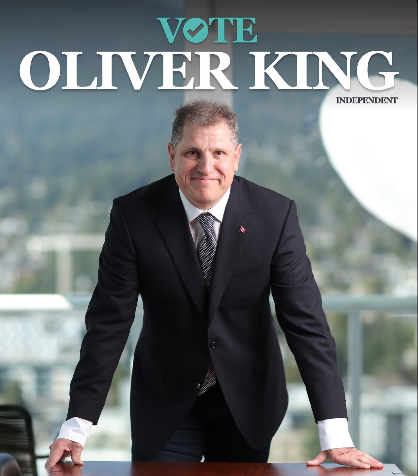 Oliver King speaking with community supporters at a campaign event in North Vancouver